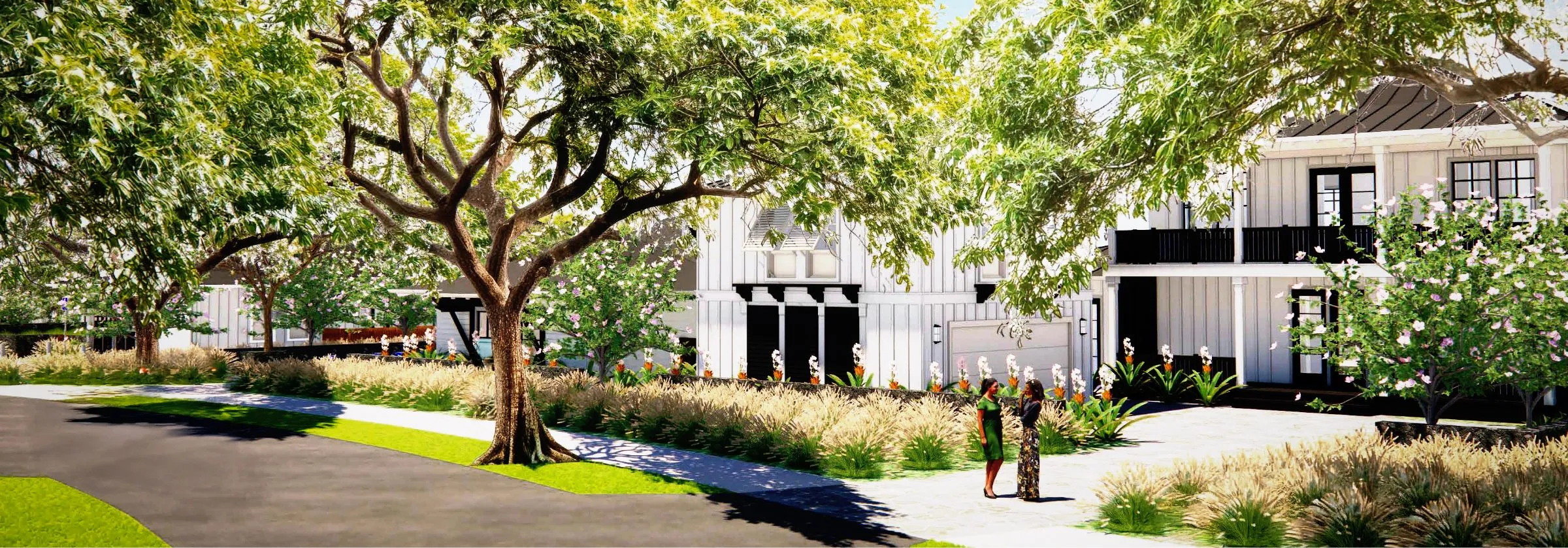 Tree-lined street with modern white houses and lush landscaping.