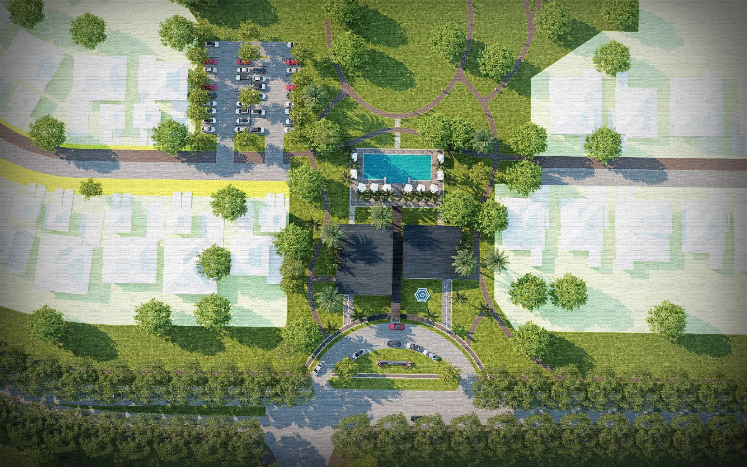 Aerial view of a landscaped area with pool, parking, and pathways.