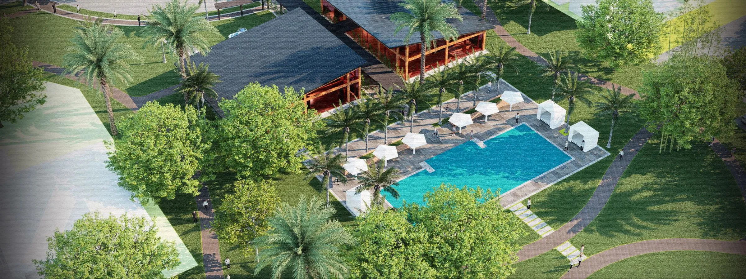 Aerial view of a resort with pool, palm trees, and pathways.