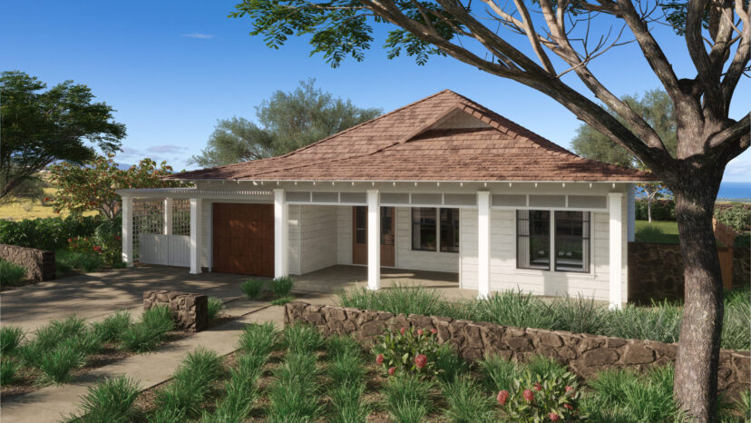 A small, white, one-story house with a wooden front door, surrounded by trees and shrubs, under a clear blue sky.