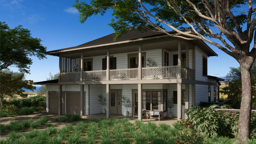 Two-story house with wraparound porch, surrounded by greenery and trees under a clear blue sky.