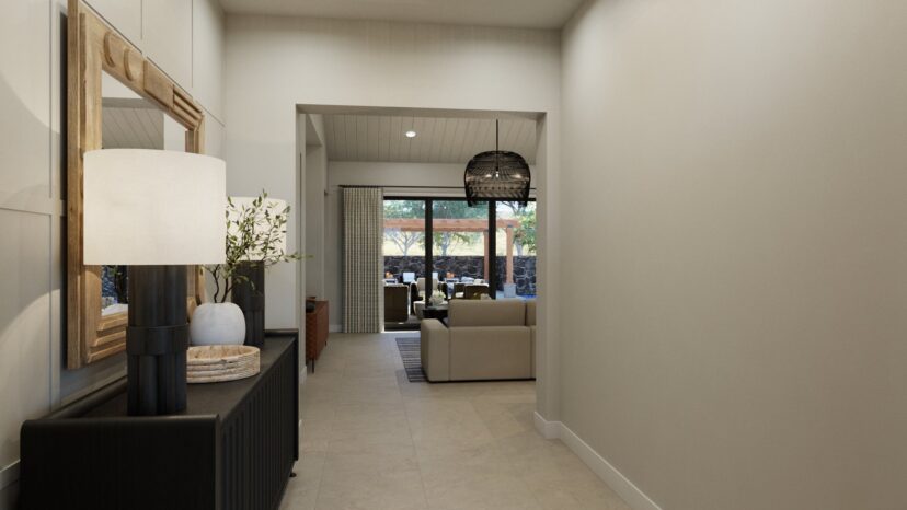 A hallway leads to a living room with cream sofas, a woven pendant light, and large windows. A side table with a lamp and decor pieces is on the left.