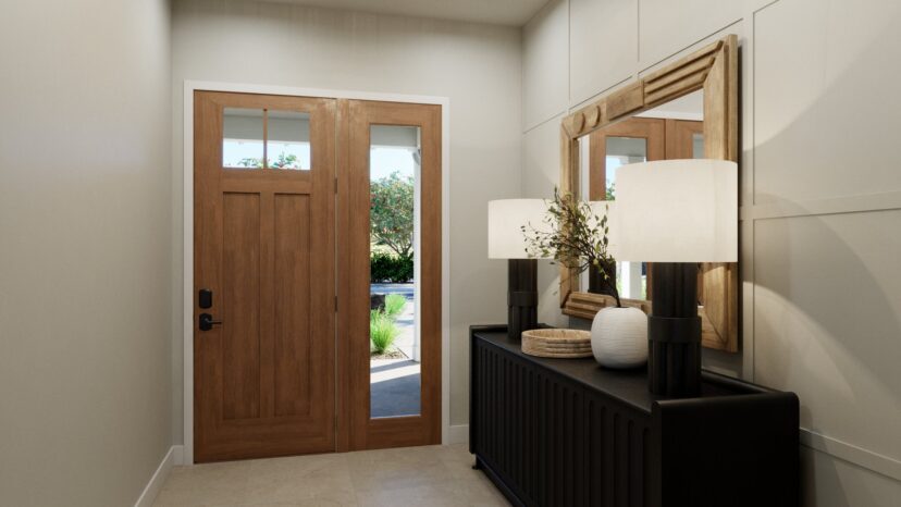 A hallway features a wooden front door with sidelights, a console table with two lamps and decorative items, and a large framed mirror above.