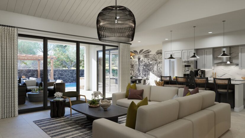 Spacious living room and kitchen with beige sofas, dark coffee table, pendant lights, and large glass doors leading to a patio with outdoor seating.