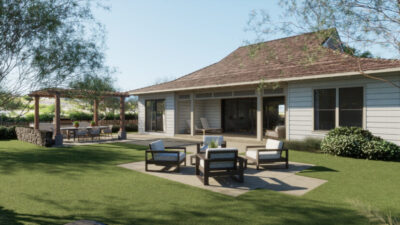 A backyard with a patio set on grass, a wooden pergola with additional seating, and a single-story house with large windows in the background.