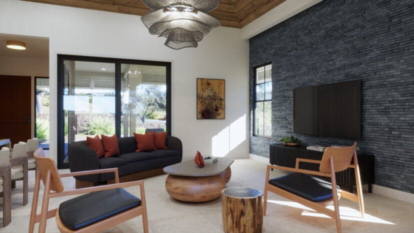 Modern living room with a dark sofa, two wooden chairs, round coffee table, and a wall-mounted TV. Large windows provide natural light, and a patterned light fixture hangs from the ceiling.