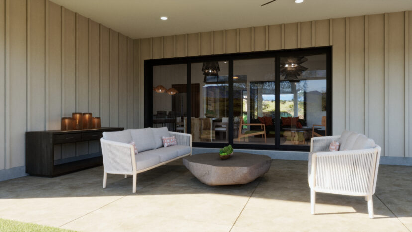 Outdoor patio with two white sofas, a stone coffee table, and a console table with decor. Large glass doors reveal indoor dining area. Neutral tones throughout.