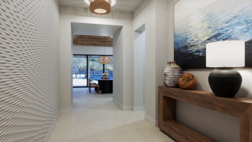 A hallway with textured walls, a wooden console with pottery, a painting, and a lamp. A dining area with a wicker light fixture and a view of a garden is seen at the far end.